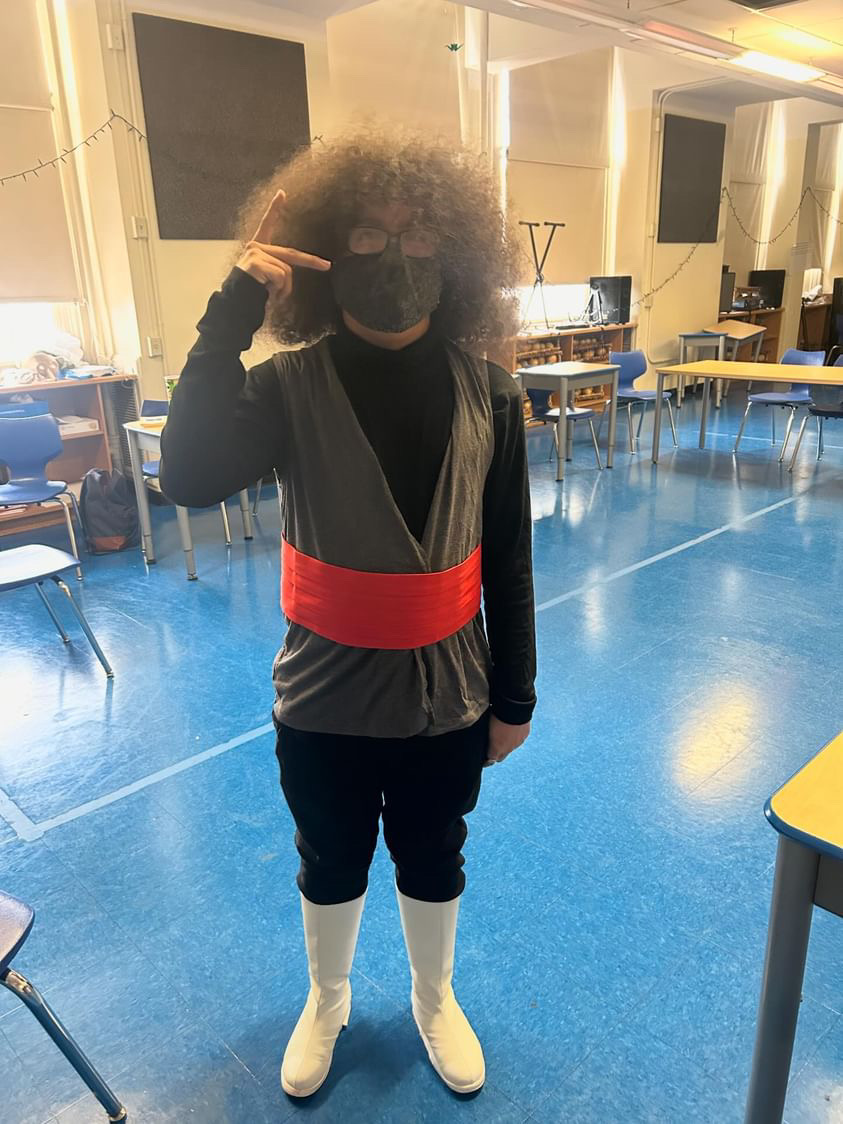 Heriberto Vasquez, senior, dressed as Goku Black from DBZ